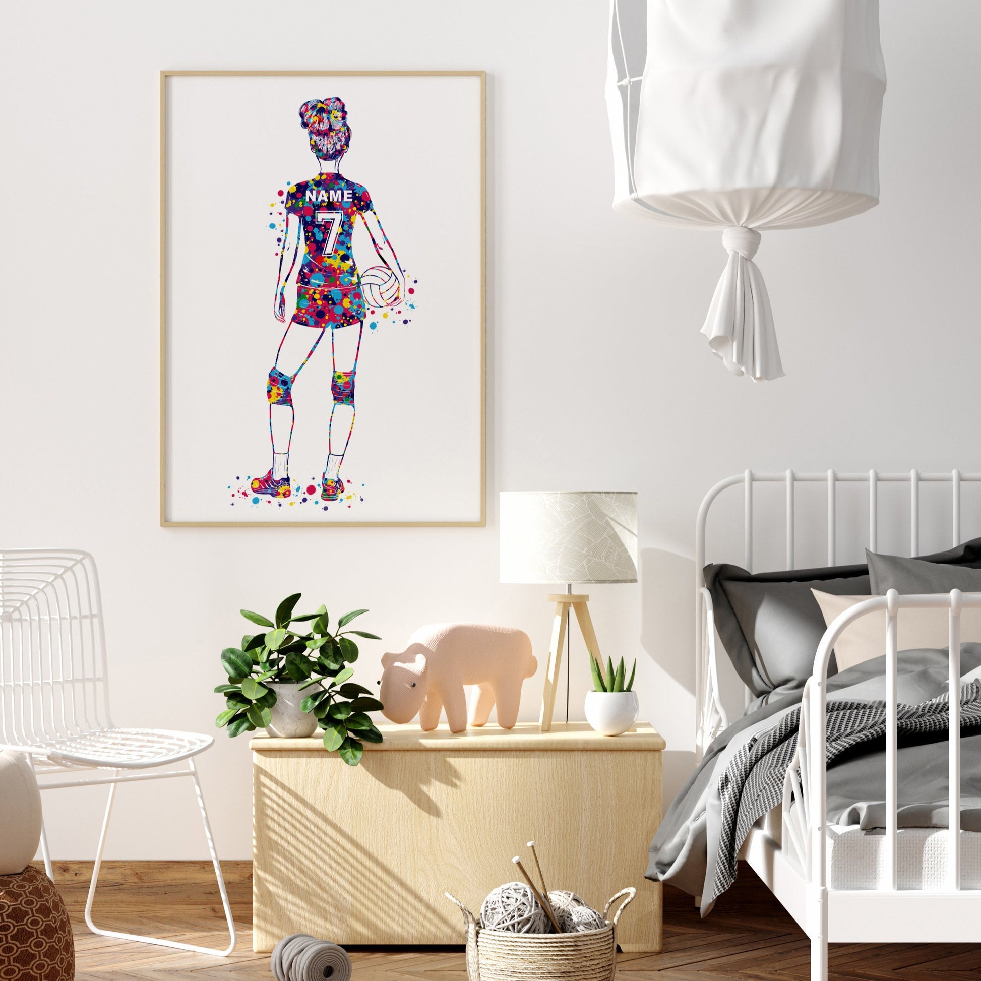 Personalized volleyball poster showing a girl volleyball player facing backwards with a custom name and number on the volleyball jersey. Designed in colorful watercolor splatters. Perfect volleyball gifts for girls, volleyball prints, volleyball wall art décor in a girls bedroom and birthday gifts for girls.