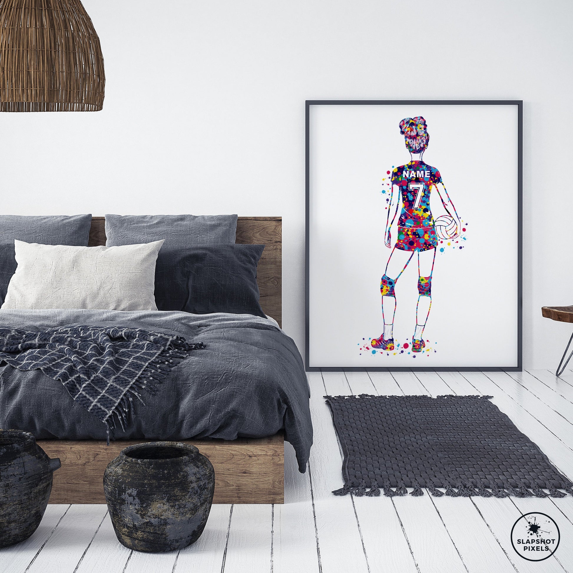 Personalized volleyball poster showing a girl volleyball player facing backwards with a custom name and number on the volleyball jersey. Designed in colorful watercolor splatters. Perfect volleyball gifts for girls, volleyball prints, volleyball wall art décor in a girls bedroom and birthday gifts for girls.